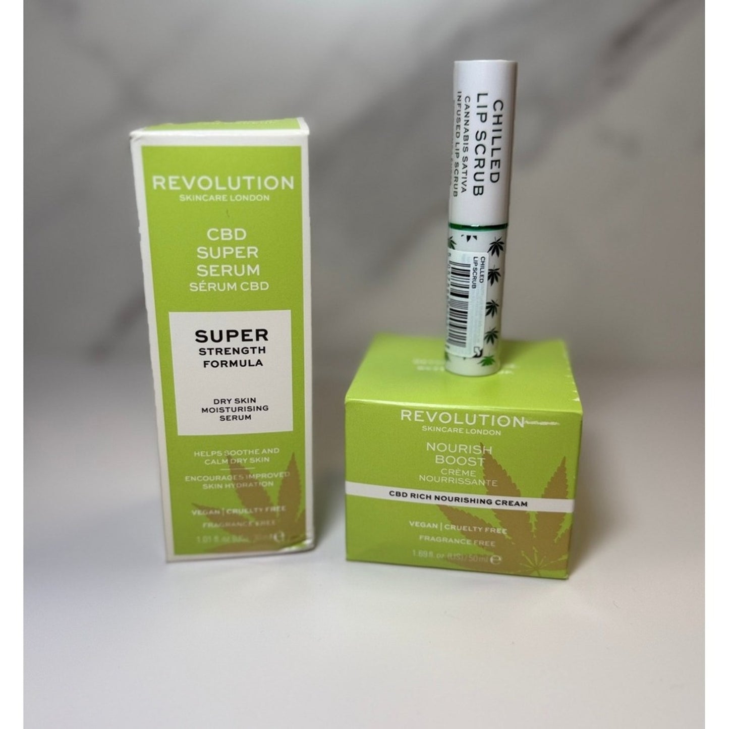 Revolution CBD Super Serum and Nourish Boost Cream Set w/ FREE Lip Scrub